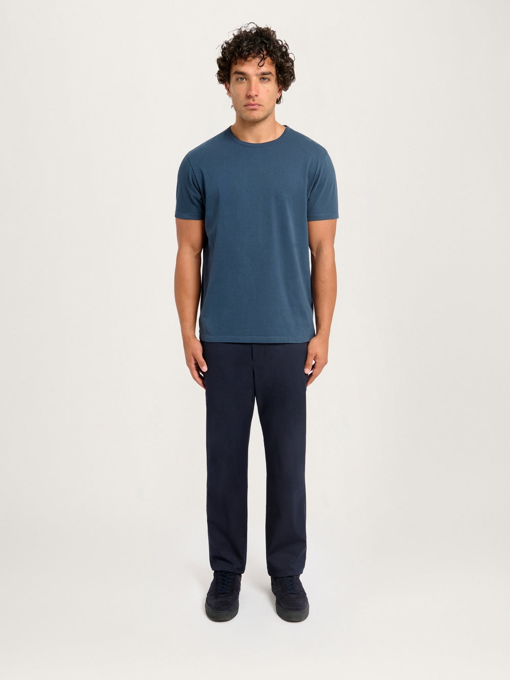 Model wearing Lestrange London Classic Tee in Pebble, short sleeve organic cotton t-shirt, front view