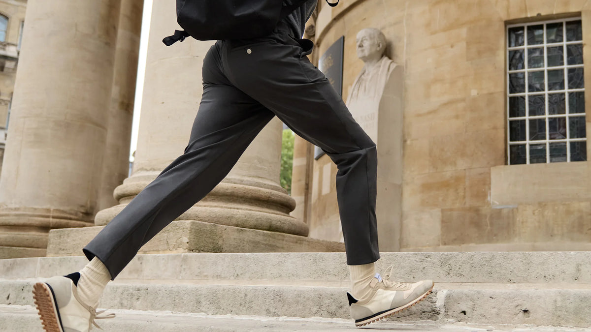 The 360 Trouser in motion on stone steps
