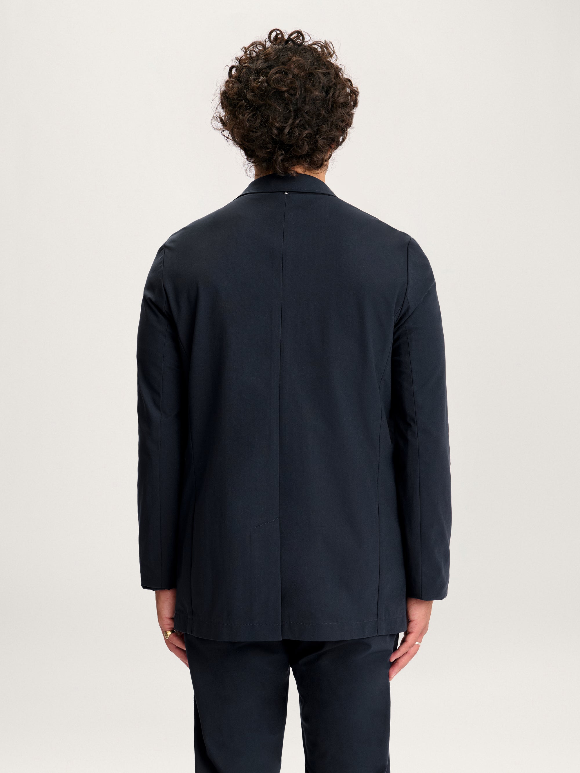 Men’s Lestrange 360 navy blazer – back view showing clean seam and modern silhouette.