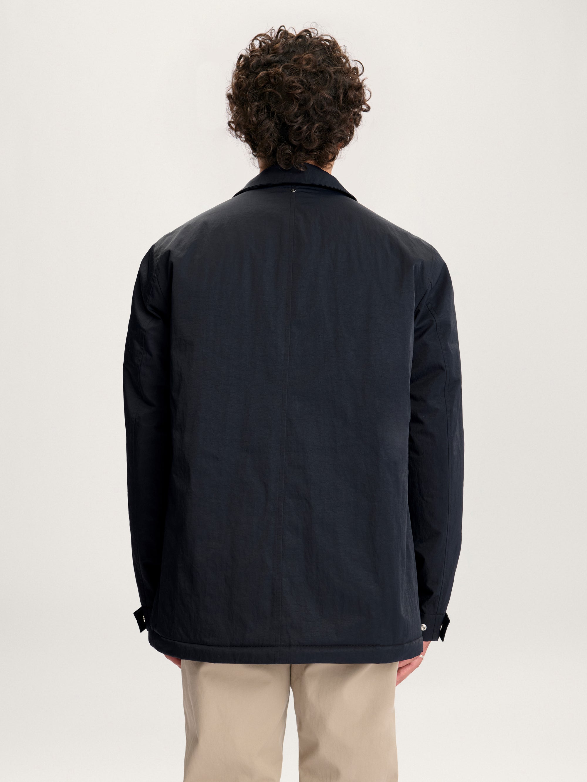 Back view of lestrange 360 Field Jacket in Navy showing clean, minimal design and structured fit