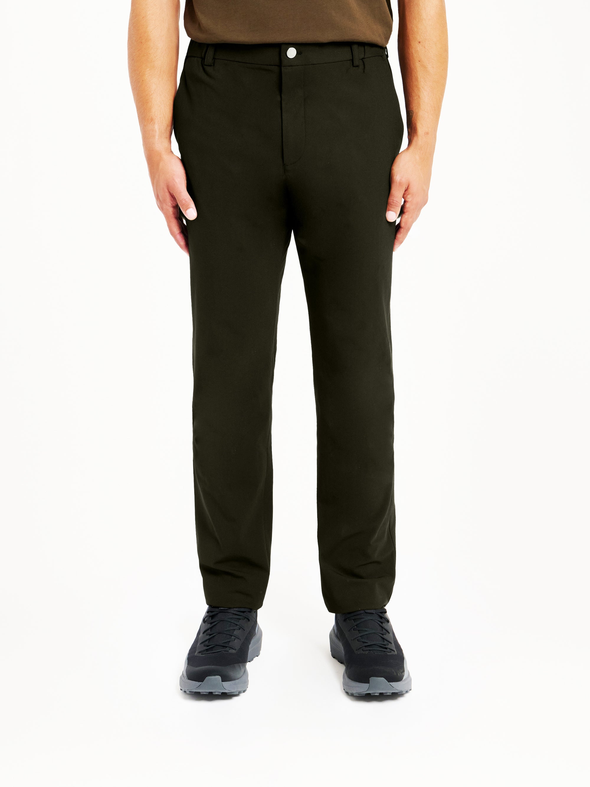 Front view of the Lestrange 360 Trouser in Dark olive, showing the waistband, front pockets, and clean tapered fit.
