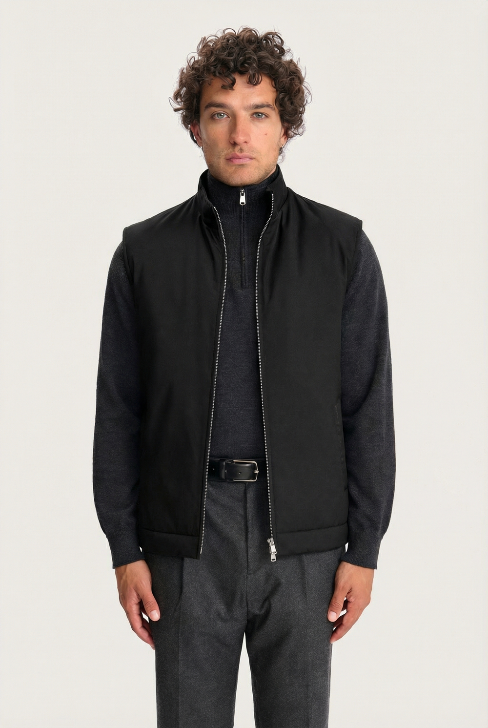 Black Lestrange 360 Thermal Vest for men, front view, styled over dark grey zip-neck knit and tailored trousers