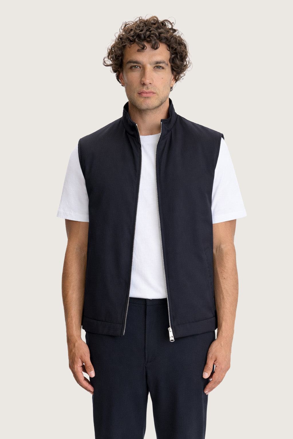 Men’s navy Lestrange 360 Thermal Vest, front view, styled over white T-shirt with tailored navy trousers