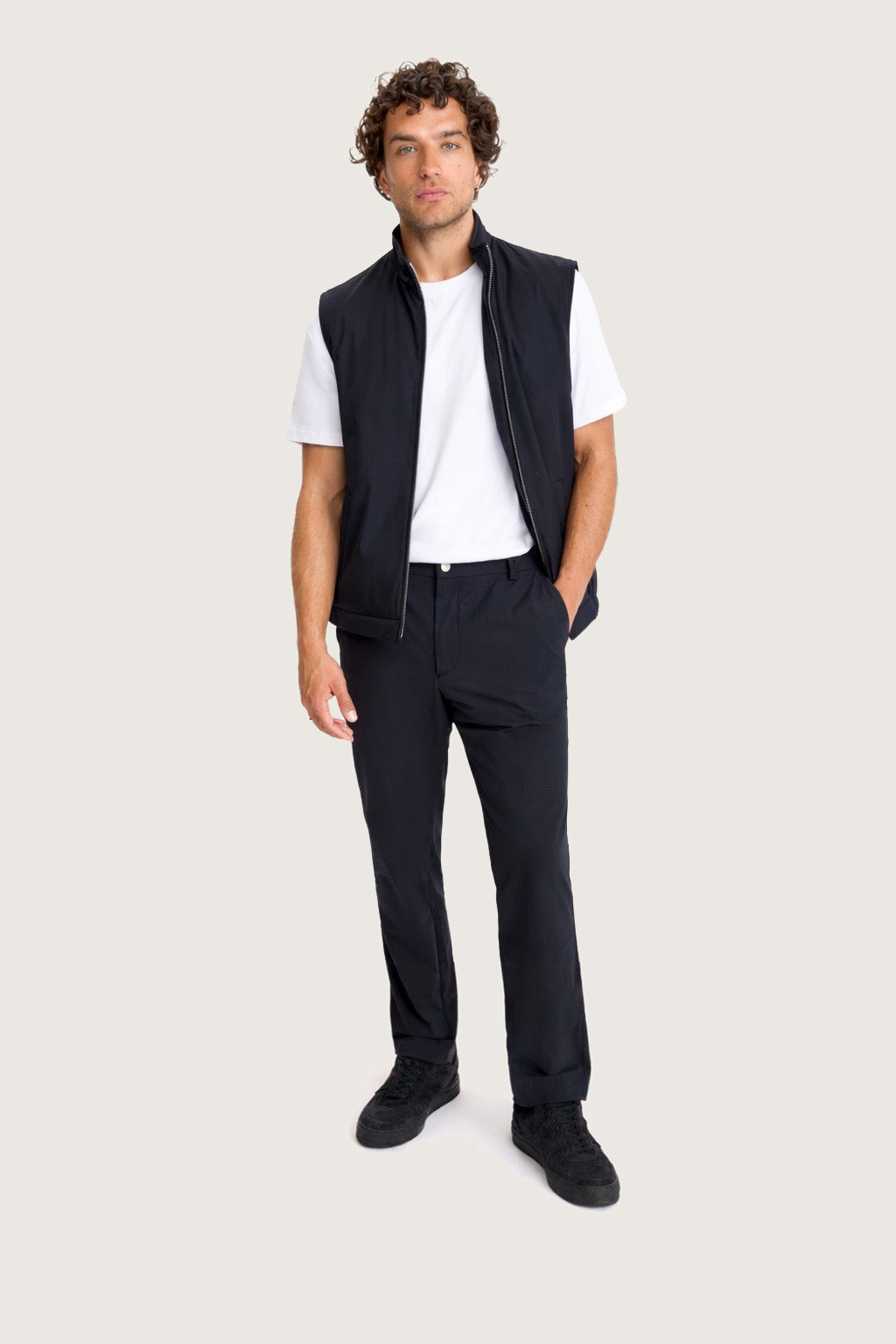 Lestrange 360 Thermal Vest in navy, full-length outfit view, layered over white T-shirt with matching navy trousers and black trainers