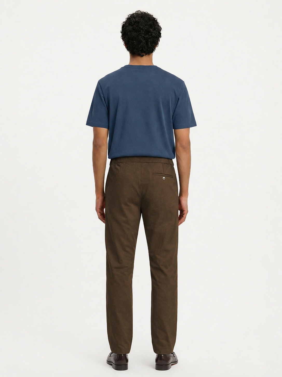 Back view of LESTRANGE khaki trousers showing relaxed fit, elasticated waistband and rear pocket detail