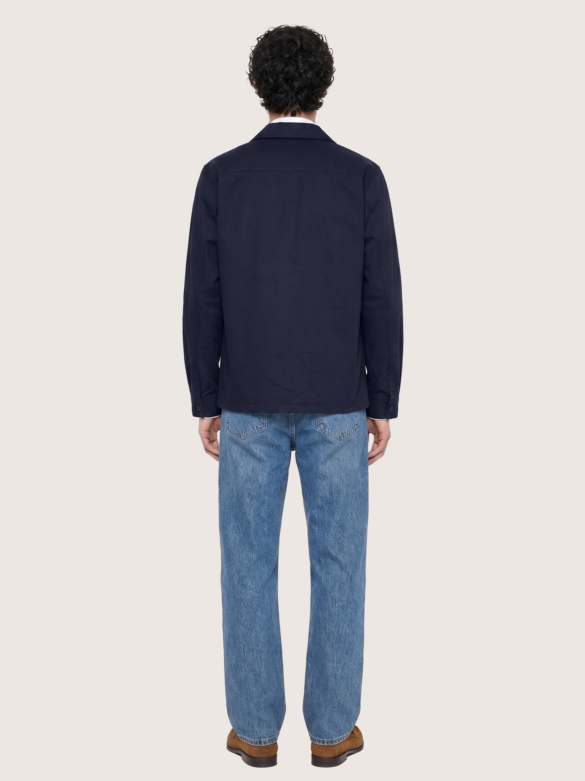 Back view of the LESTRANGE navy overshirt, showing the clean straight fit, pointed collar and buttoned cuffs.
