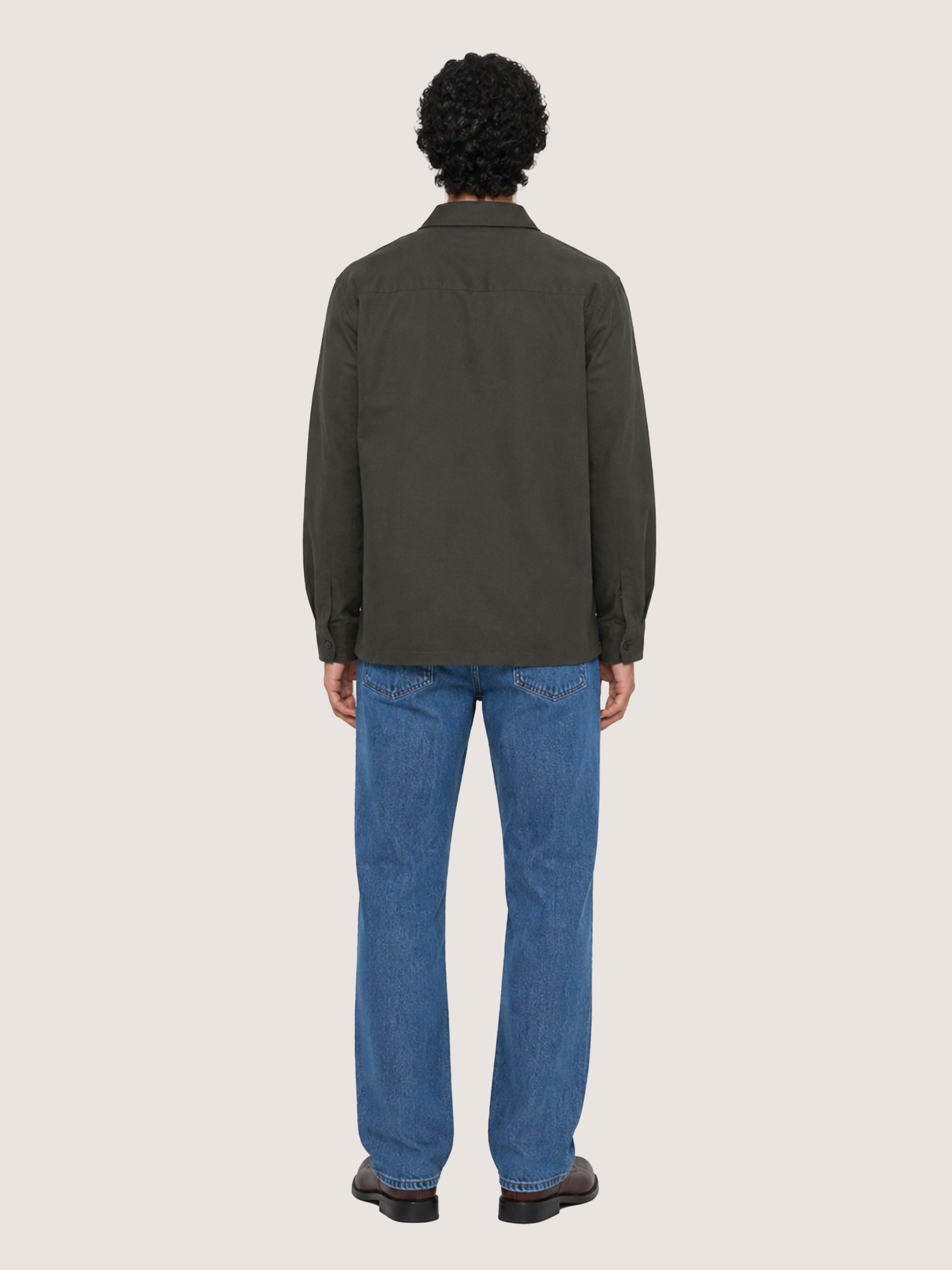 Back view of the LESTRANGE dark olive overshirt, showing the clean straight fit, pointed collar and long sleeves.
