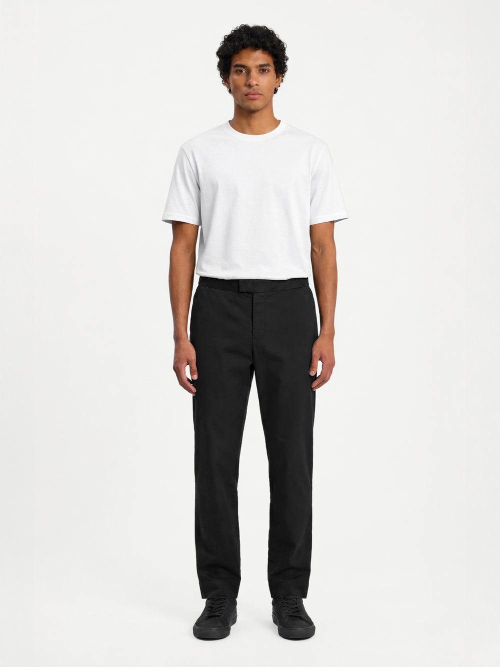 LESTRANGE black trousers worn with a white t-shirt, front view showing a clean tailored fit and straight-leg silhouette.