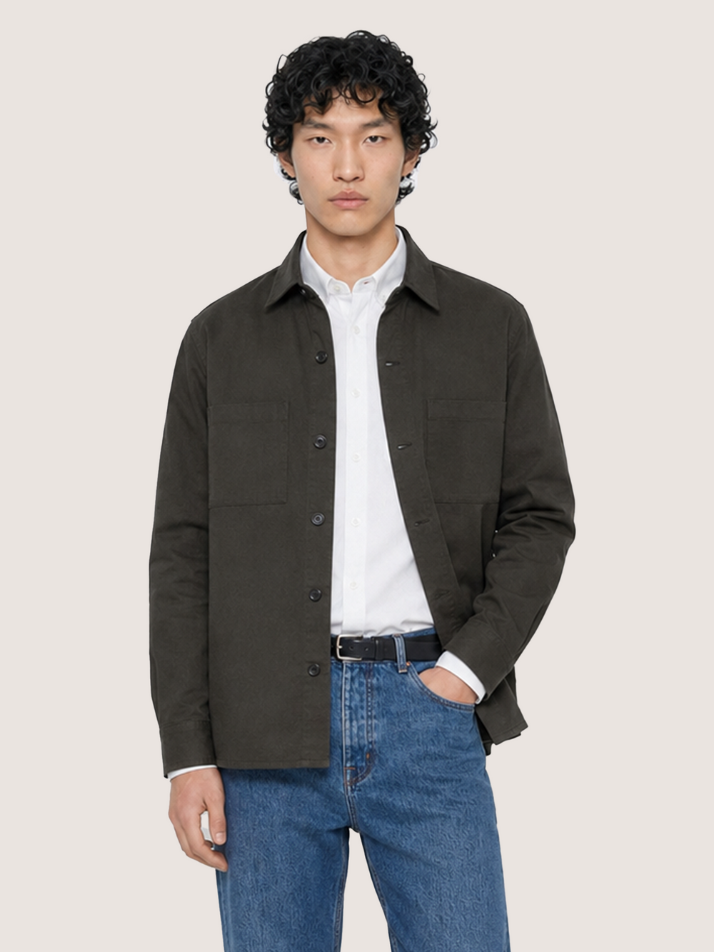 Half-body view of the LESTRANGE dark olive overshirt, showing the button front, chest pockets and relaxed fit.