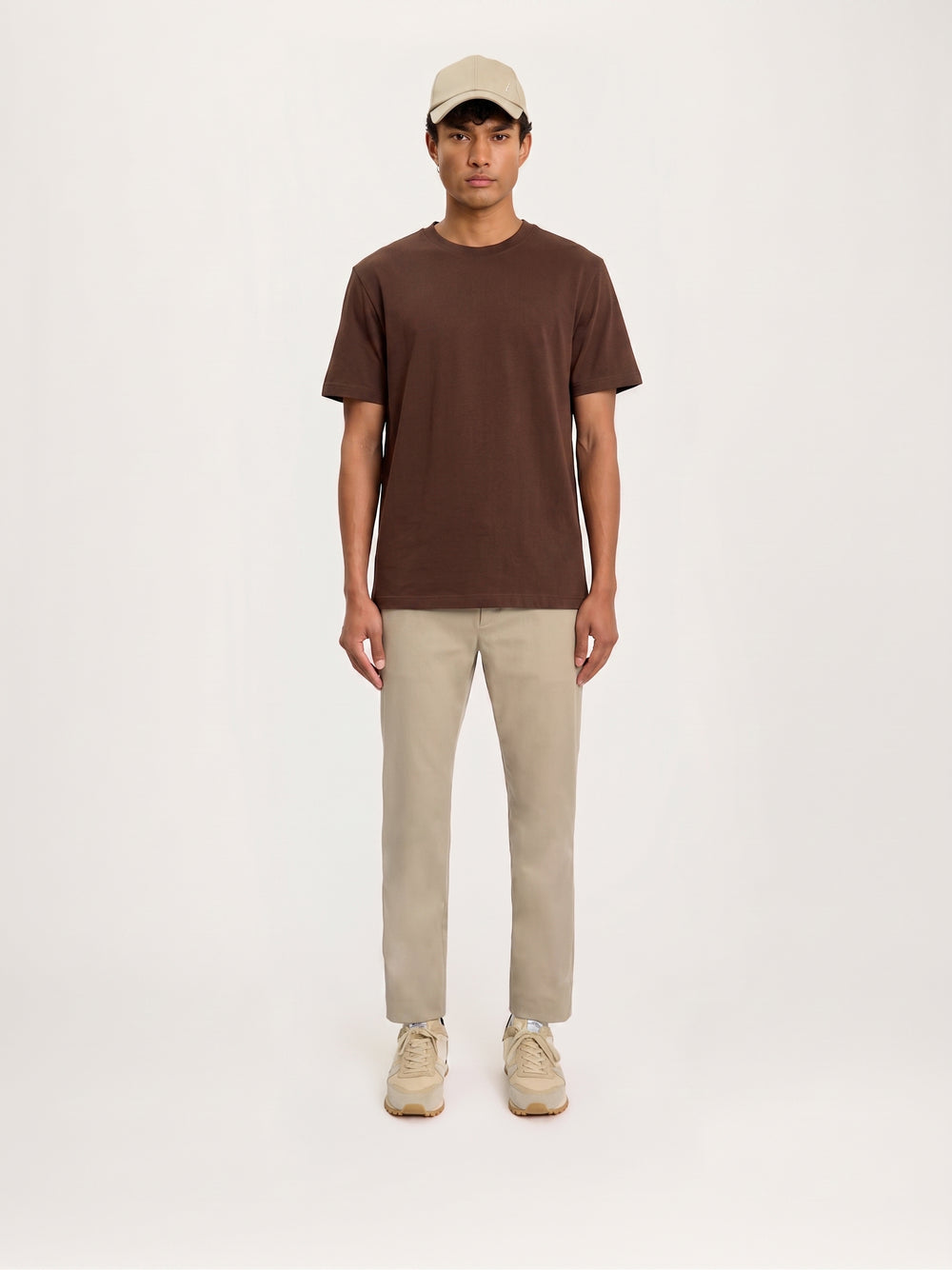 Lestrange London heavyweight terracotta t-shirt full body front view styled with neutral trousers