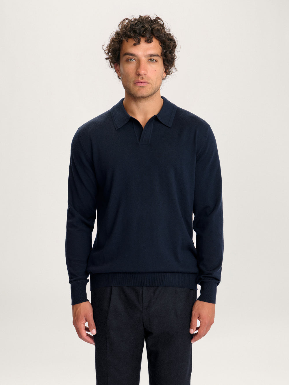 Lestrange Merino Long Sleeve Polo Navy – front view of timeless men’s merino knit polo shirt in dark blue