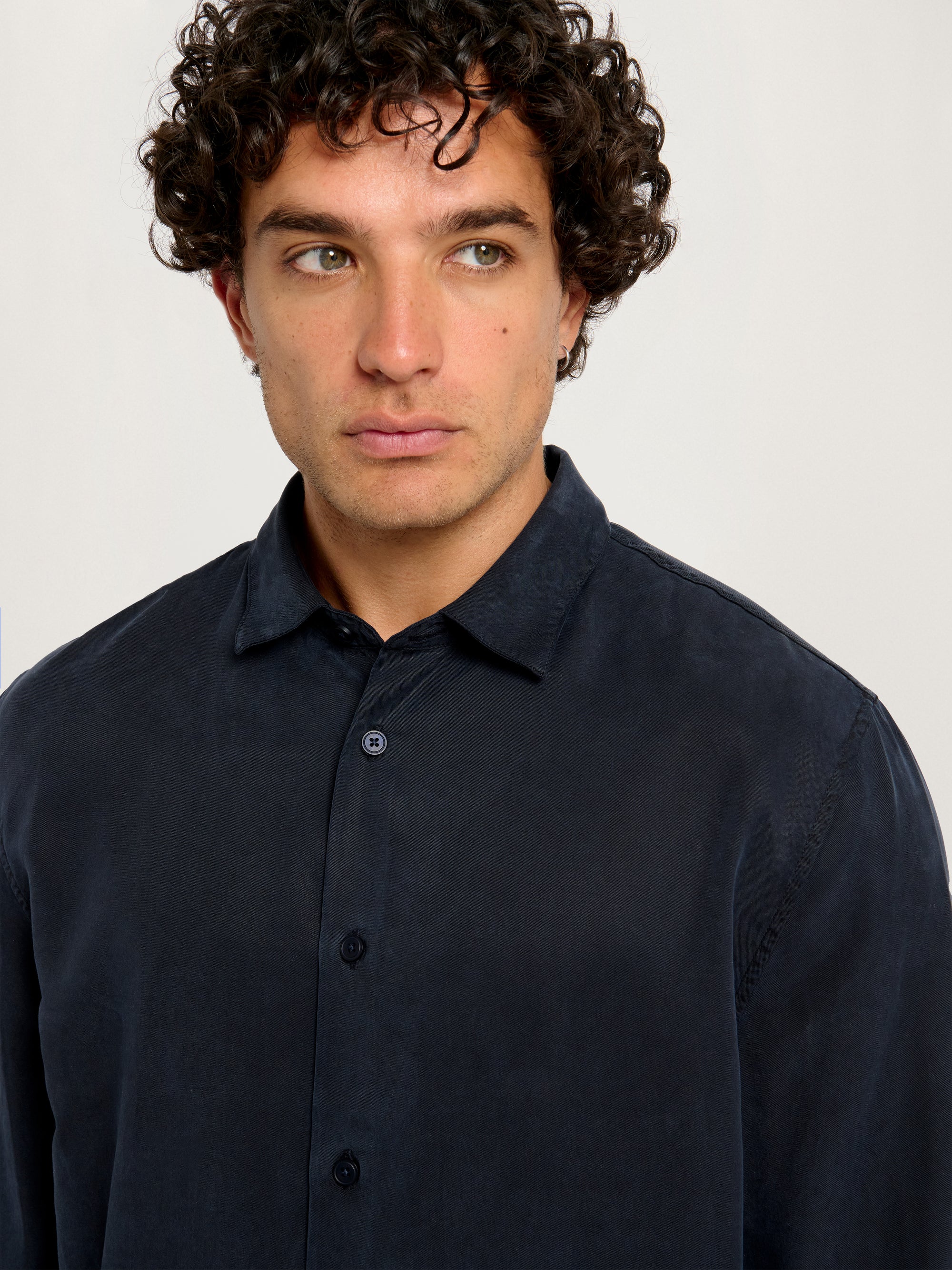 Close-up of Relaxed Tencel Shirt in navy – soft sustainable fabric long sleeve shirt by Lestrange London