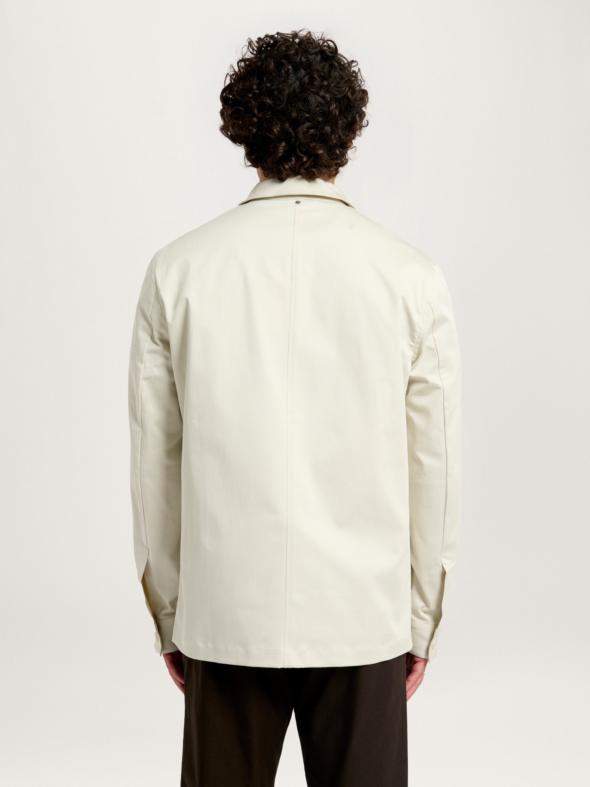 Back view of Men’s Utility Jacket in Flint – Minimal modern design in off-white