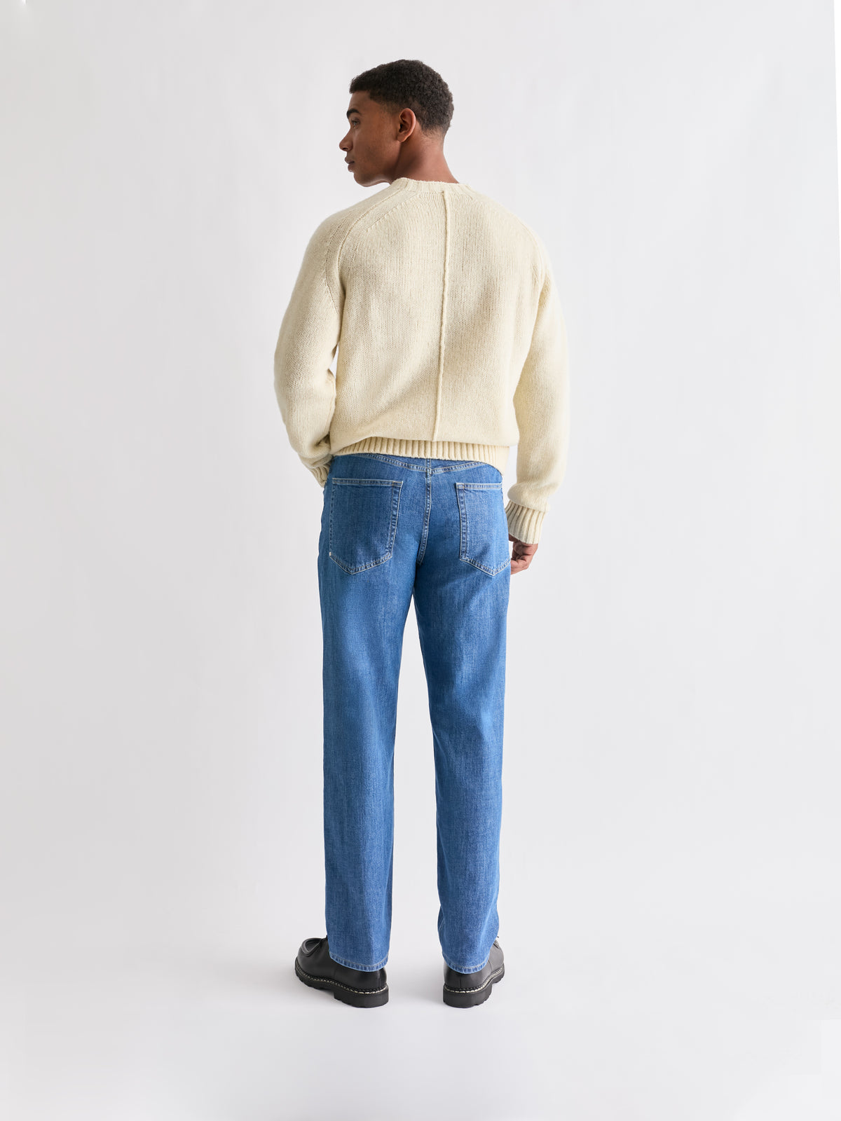 The 24 Jeans Straight Fit in Light Blue, rear view showing back pockets and straight-leg silhouette