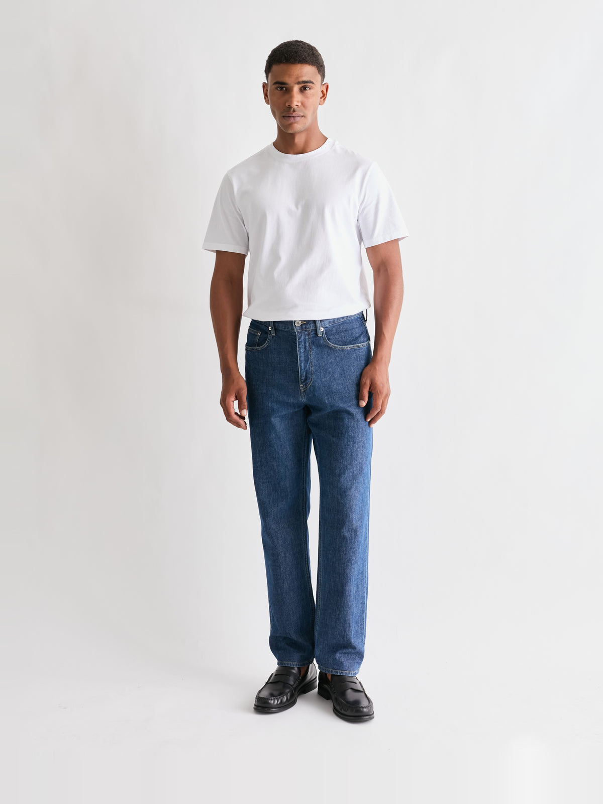 The 24 Jeans Straight Fit in Mid Blue, full front view styled with a white T-shirt