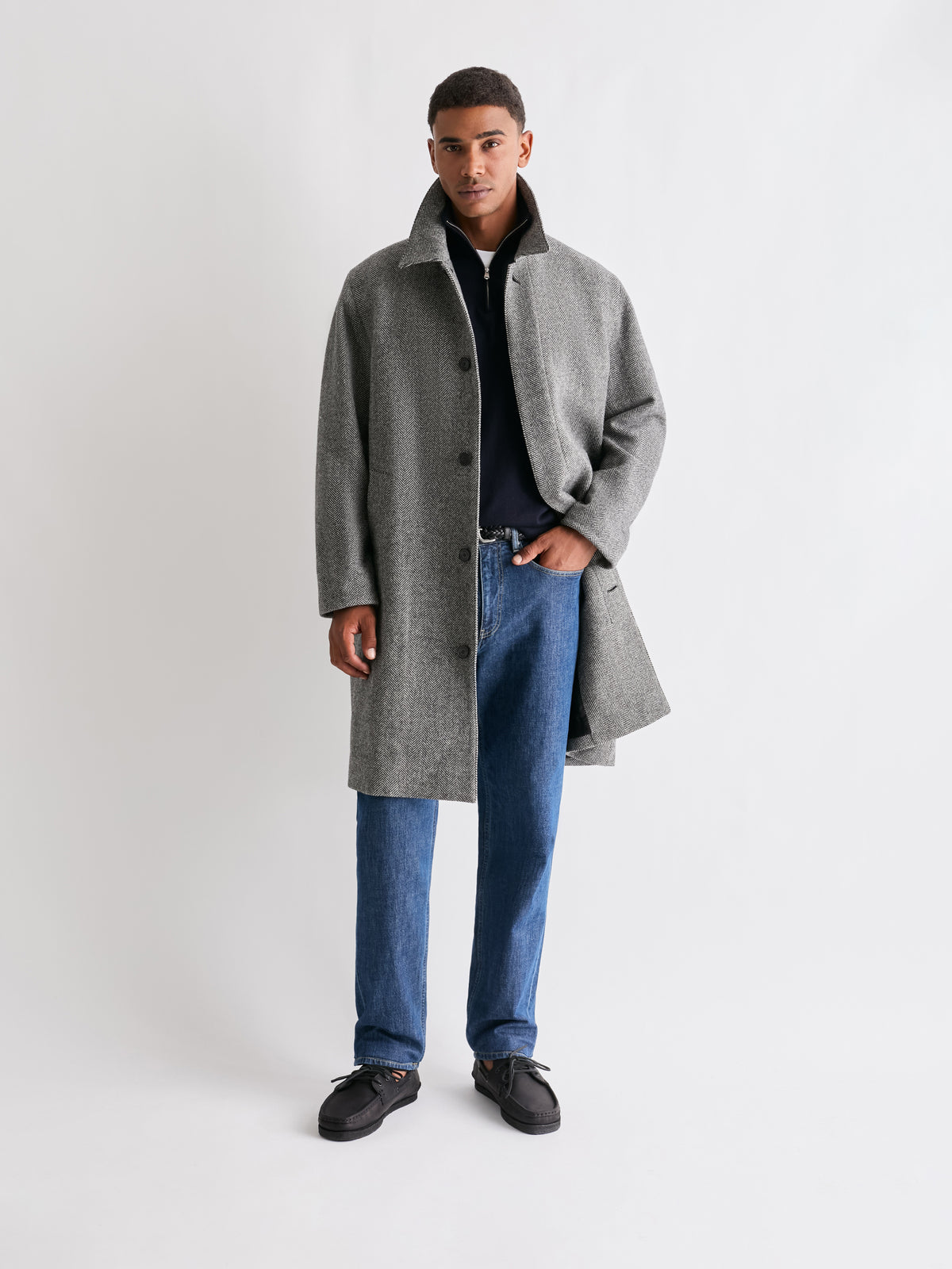 The 24 Jeans Straight Fit in Mid Blue styled with a grey overcoat and dark knitwear