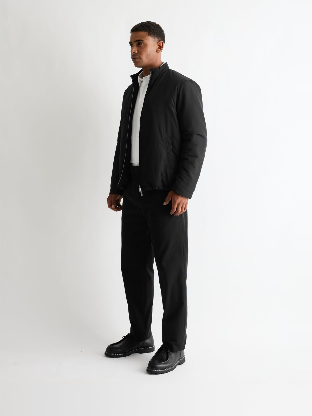 The 360° Thermal Jacket Funnel Neck, Black, three-quarter front