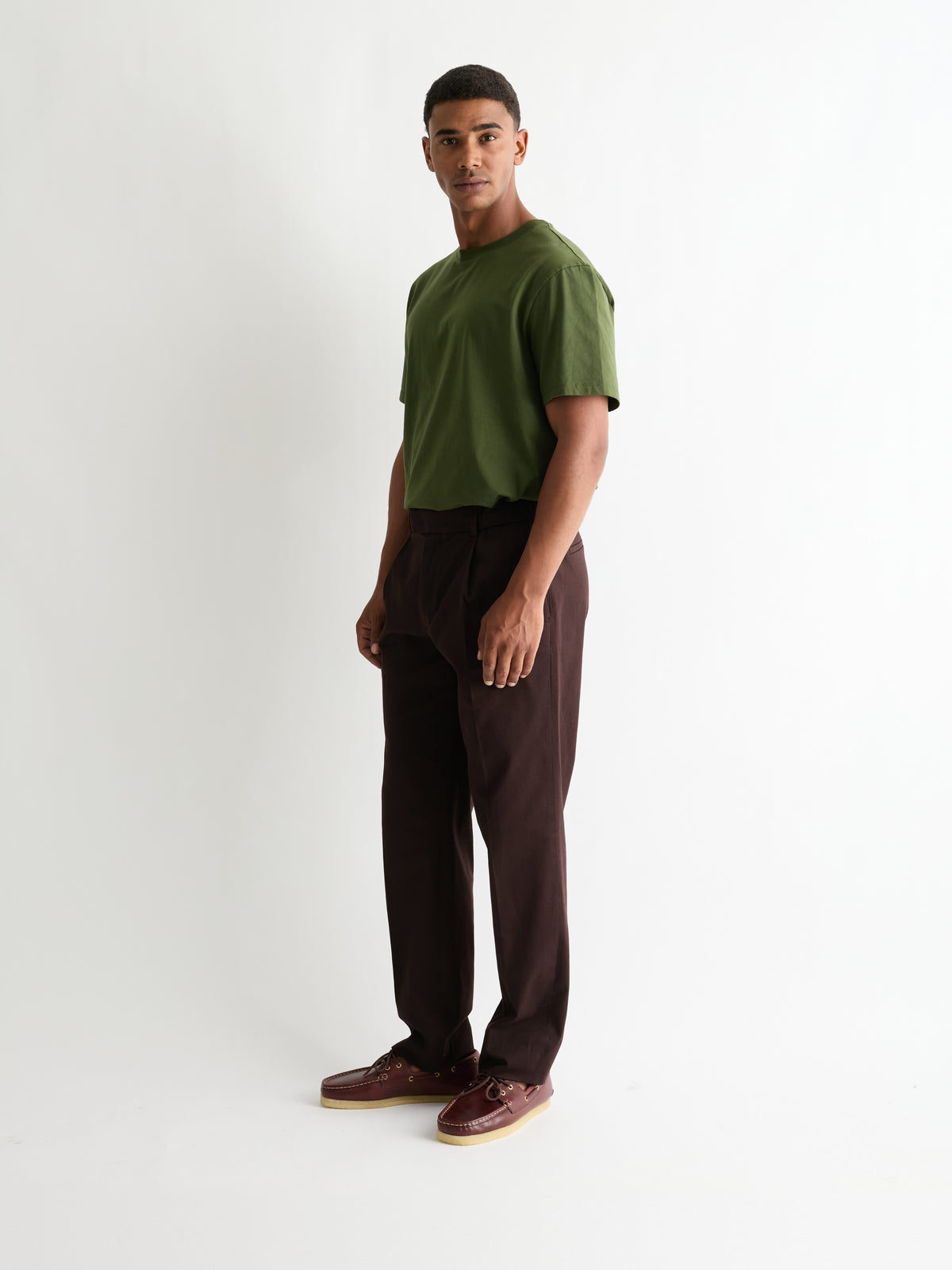 The Heavyweight Tee in Dark Olive, three-quarter