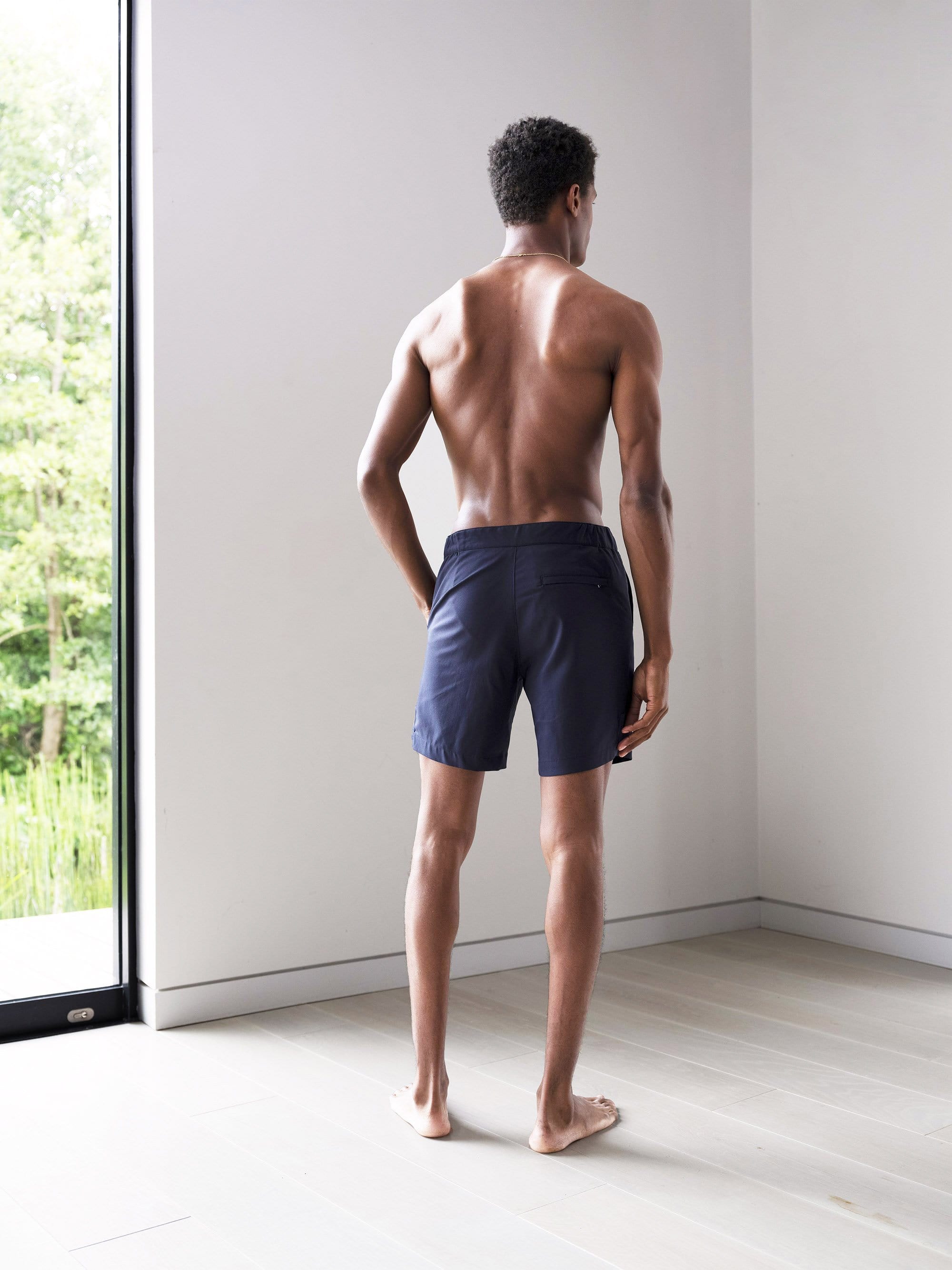 The Anywear Swim Short || Navy | Recycled nylon with netting